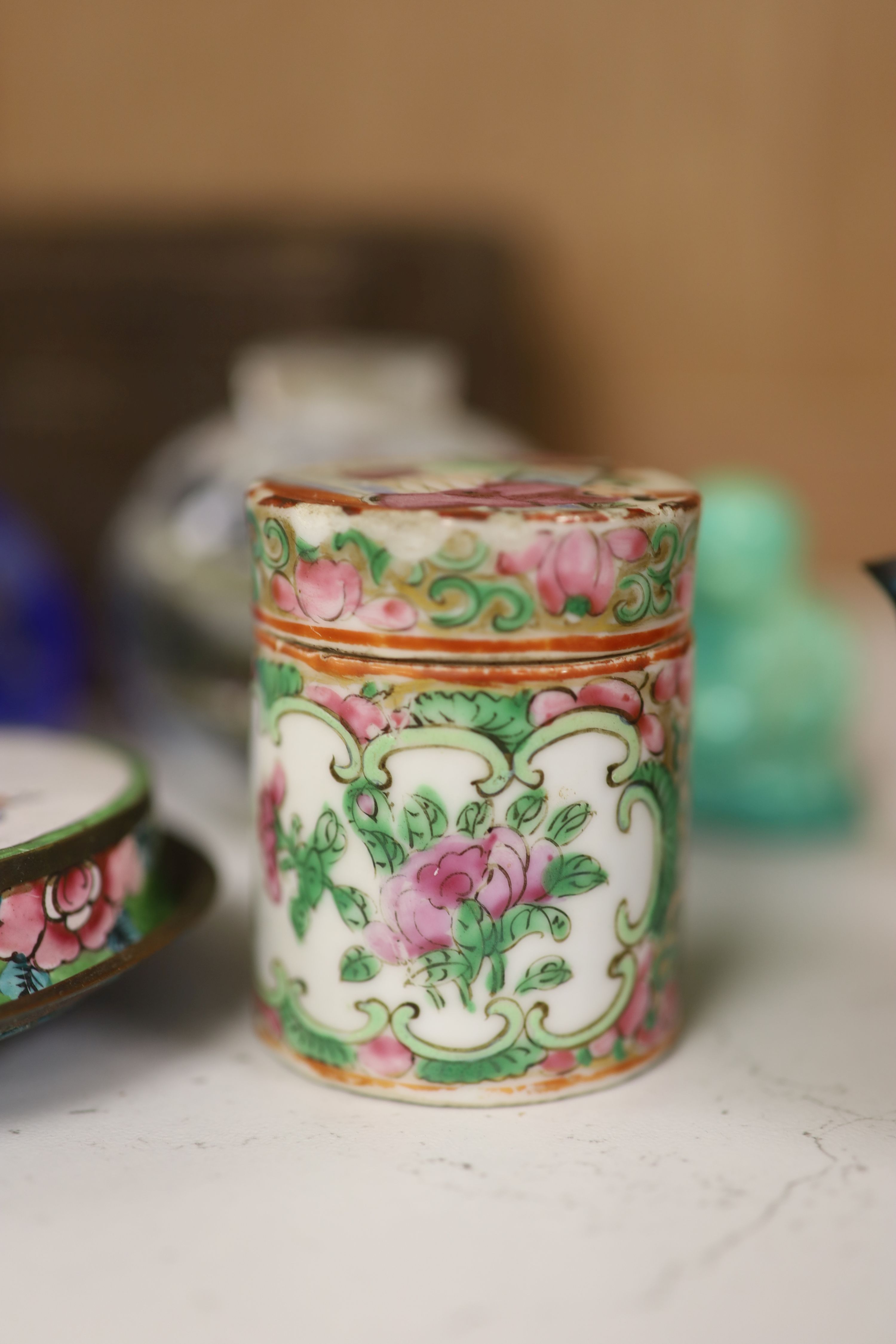 A small miscellaneous Oriental collection including enamel snuff boxes, Buddha carvings etc.